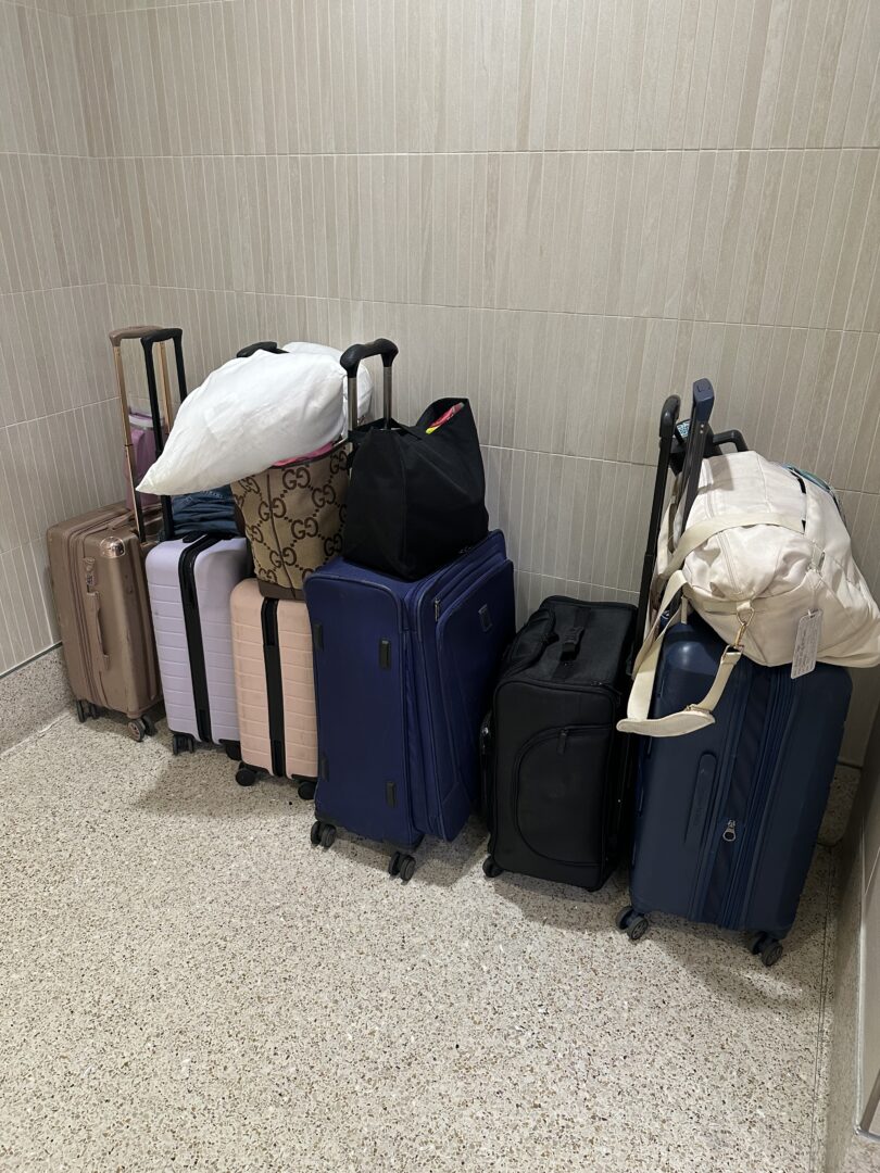A collection of wedding planners' suitcases en route to the venue