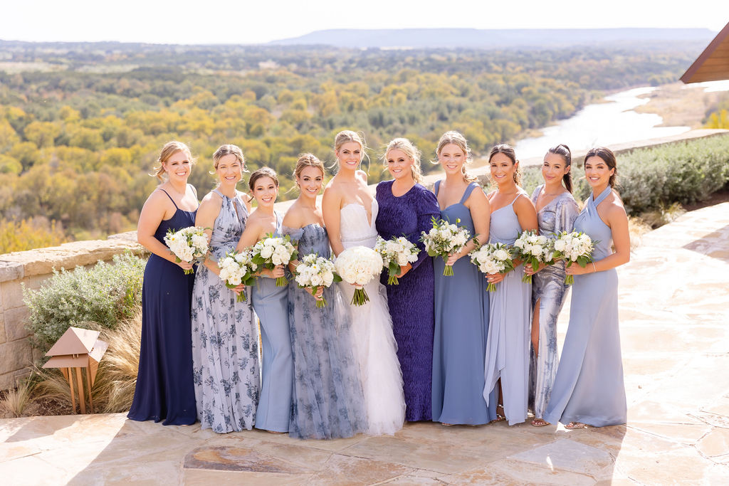 Shades of blue bridesmaids attire for a fall wedding