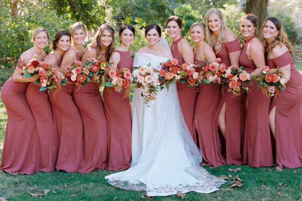 Dusty rose bridesmaids attire for a fall wedding