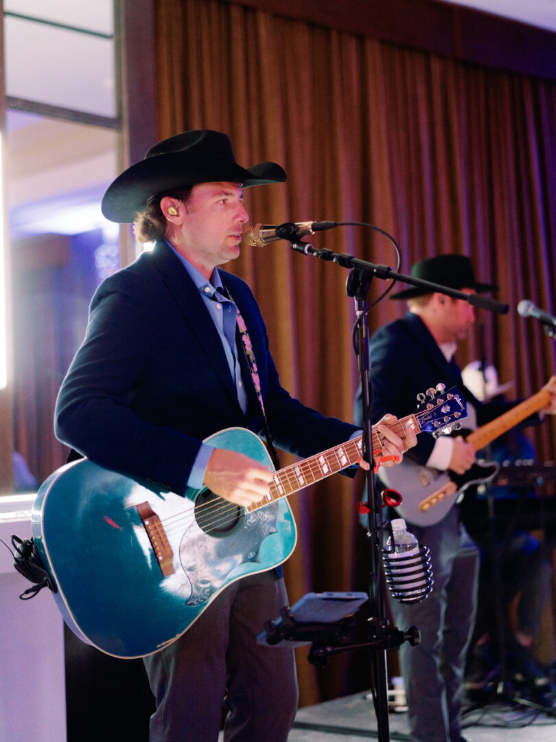 A country music band provides entertainment at a retirement party.